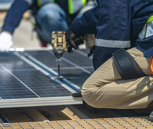 Solar engineer testing inverter and wiring